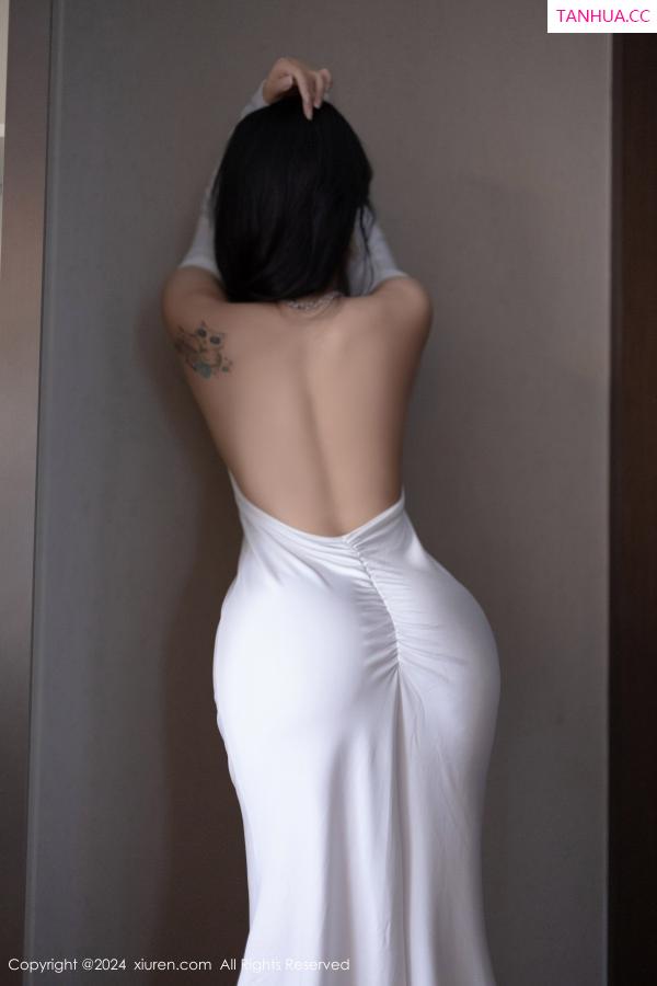 小娜比  [XiuRen]高清写真图 2024.09.05 No.9115 娜比 黑丝美腿第26张图片